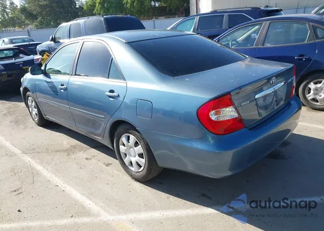 2003 Toyota Camry Le z USA, uszkodzony, nr VIN 4T1BE32K23U732018